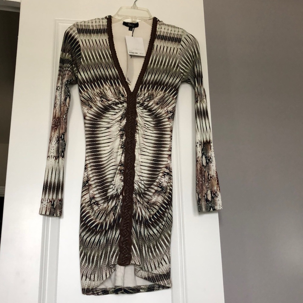 New sky dress with real leather trim.